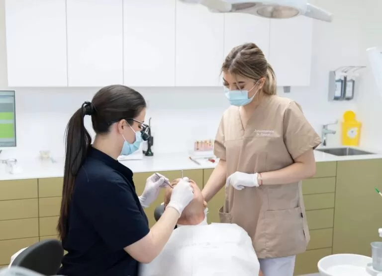 Dr. Zgkouri treating a senior male patient